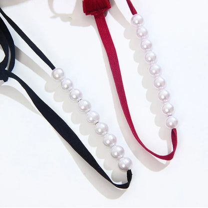 Stringi z regulowanymi paskami w biodrach