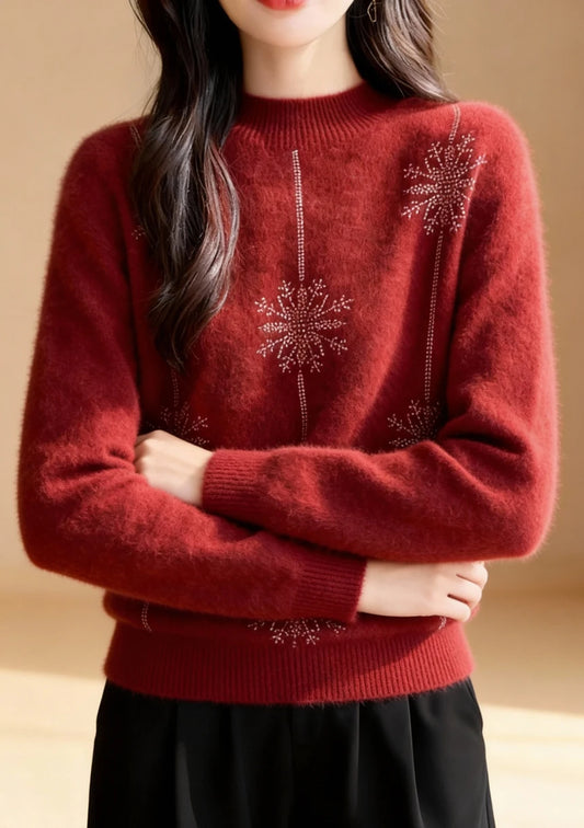Miękki sweter z ozdobnymi śnieżynkami